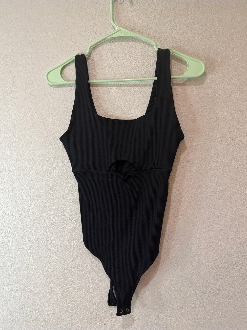 Black Ribbed One-Piece Bodysuit